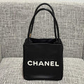 Chanel 2026 Camellia Letter Reversible Tote Bag 25cm Black White Leather